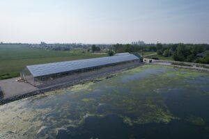 Aerial photo of the Slater Wastewater Plant's RAB (Revolving Algal Biofilm)